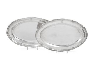 A Near Pair of German Silver Serving Platters
