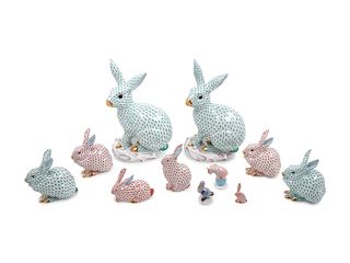Nine Herend Painted and Parcel Gilt Porcelain Rabbits 