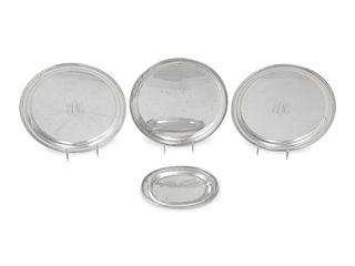 A Group of Four American Silver Platters