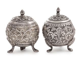 A Pair of Southeast Asian Silvered Metal Casters