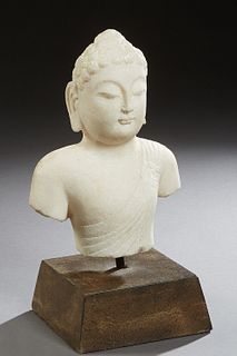 Carved Marble Bust of Buddha, 19th c., on an iron rod support to a sloping side stone plinth, Bust- H.- 12 1/2 in., W.- 8 1/2 in., D.- 6 in., Total H.