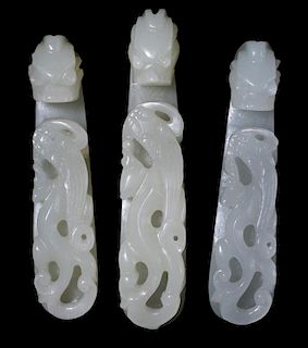 Three Finely Carved Dragon-Form Jade