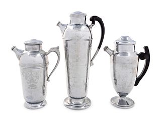 A Group of Three Cocktail Shakers