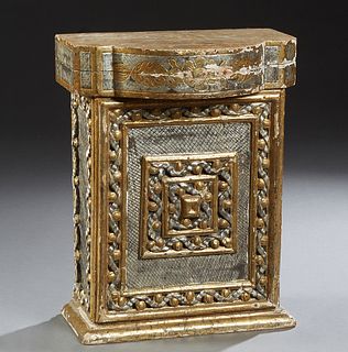 Italian Carved Wood Reliquary Cabinet, 18th/19th c., with gilt and silver leaf decoration, the bowed crown with incised fruit and flower decoration, o