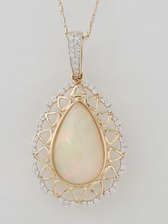 14K Yellow Gold Pendant, with a pear shaped 6.89 ct. cabochon opal atop a pierced border of small round diamonds, with a diamond mounted bail, on a ti