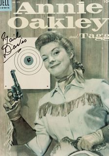 Annie Oakley Dell Comic book Cover, signed by Gail David 
9 x 7 inches.