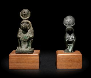 Two Egyptian Bronze Thoth Baboons
Height of taller example 2 3/8 inches; height of shorter example 2 1/16 inches.