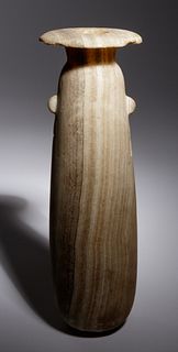 A Large Egyptian Alabaster Alabastron
Height 9 3/4 inches.