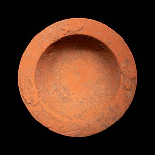 A Roman Terra Sigillata Bowl
Diameter 5 5/8 inches.