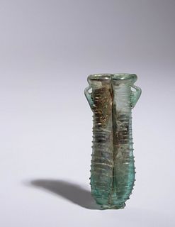 A Roman Glass Double Unguentarium
Height 3 7/8 inches.