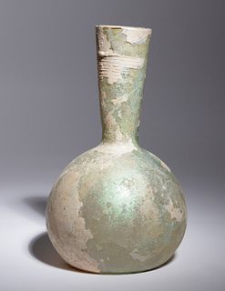 A Roman Glass Bottle
Height 8 7/8 inches.