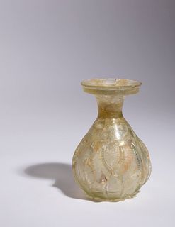 A Roman Glass Flask
Height 5 3/8 inches.