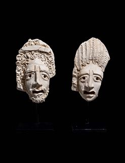 Two Palmyrene Stucco Masks
Height of each 6 inches.