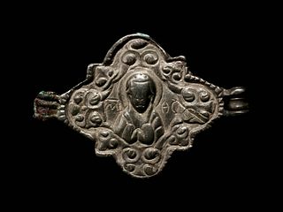 A Byzantine Silver Pendant Depicting Christ and The Virgin Mary
Width 1 7/8 inches.