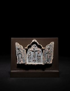 A Byzantine Lead Triptych with a Crucifixion Scene
Height 2 x width 2 3/4 inches.
