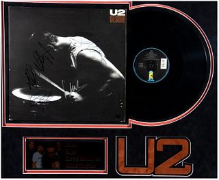U2 Band signed album cover.