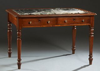 English Carved Mahogany Writing Table, 19th c., the rounded edge and corner stepped top with remnants of an inset cloth writing surface, over two frie