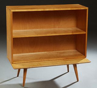 Paul Mccobb Planner Group Carved Maple Mid-Century Modern Open Bookcase, on splayed cylindrical legs, H.- 34 1/2 in.,W.- 36 in., D.- 18 1/4 in.