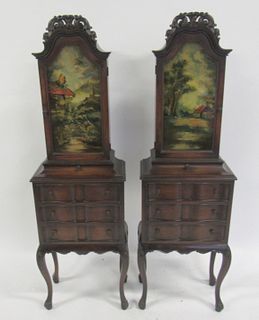 An Antique Pair Of Cabinets With Reverse Painted
