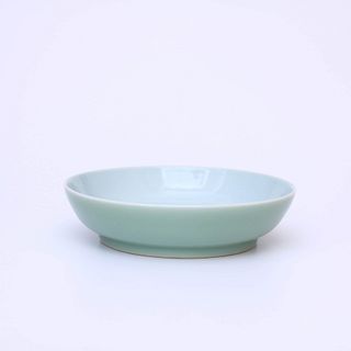 A Chinese Pea Green Porcelain Plate