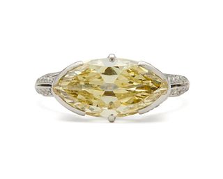 Platinum, Fancy Intense Yellow Diamond, and Diamond Ring