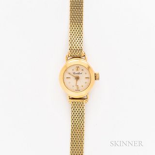 Cortebert 18kt Gold Wristwatch, silvered dial with applied and printed indices, 6-jewel ETA 578.004 quartz movement, on an 18kt gold me