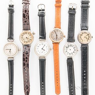 Six Illinois Watch Co. Military Trench Wristwatches, all with arabic numeral dials, one with an offset crown, nickel cases, and one in