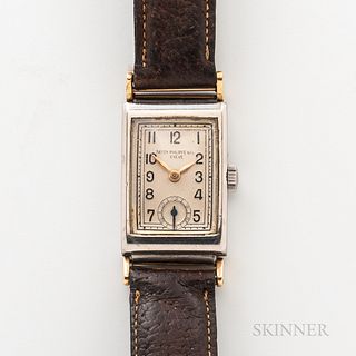 Patek Philippe & Co. Two-tone Wristwatch, two-tone stainless steel and gold case with silvered dial, raised and printed arabic numerals