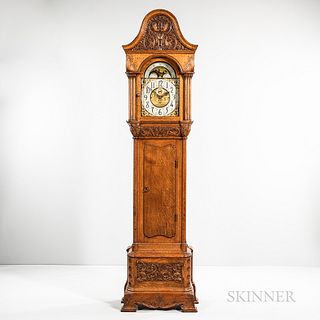 Carved Oak Quarter-chiming Hall Clock, possibly John Ellis and A.H. Davenport case, exaggerated arch-top hood with floral carved decora