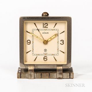 LeCoultre Art Deco Alarm Desk Clock, chrome-plated brass case with ivory-tone dial, applied gilt indices, and arabic numerals at 12-3-6