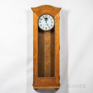 Standard Electric Time Master Clock, birch case with full-length glazed door, wood bezel surrounds the 12-in. metal roman numeral dial