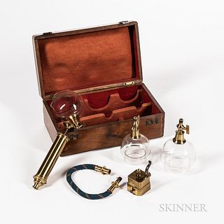 19th Century Cased Bloodletting Set, France, velvet-lined, fitted, dovetailed mahogany case with unsigned lacquered brass pump and hose