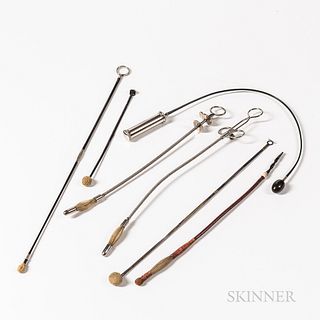 Six Probangs and a Esophageal Dilator, 19th and 20th century, steel and baleen probang instruments, and a dilator with bulbs contained