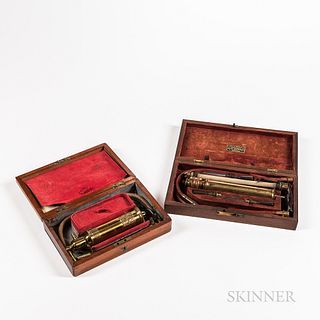 Two Mid-19th Century Stomach Pumps, England and Boston, both housed in fitted hinged mahogany boxes, an embossed brass syringe marked i