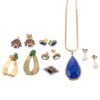 A Collection of Gemstone Jewelry in Yellow Gold