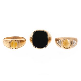 A Trio of Black Onyx & Tiger's Eye Rings in Gold