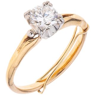 SOLITAIRE DIAMOND RING. 10K YELLOW GOLD AND PALLADIUM SILVER