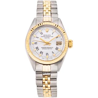 ROLEX OYSTER PERPETUAL DATE LADY. STEEL AND 14K YELLOW GOLD. REF. 6916, CA. 1975 - 1976