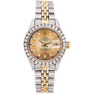 ROLEX OYSTER PERPETUAL DATEJUST LADY WITH DIAMONDS. STEEL AND 18K AND 14K YELLOW GOLD. REF. 69173, CA. 1986 - 1987