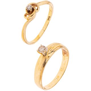 TWO SOLITAIRE DIAMONDS RING. 14K YELLOW GOLD