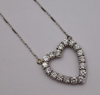 JEWELRY. Platinum, 14kt Gold and Diamond Necklace.