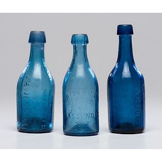 Three Cobalt Glass Soda Bottles Including a Rare Zanesville Example