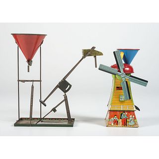 Two Lithographed Tin Sand Toys, Including McDowell Dutch Mill and Wolverine Sand Crane