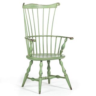 A Green Painted Volute Carved Comb-Back Windsor Armchair