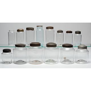 Fourteen Blown Glass Storage Jars with Tin Lids
