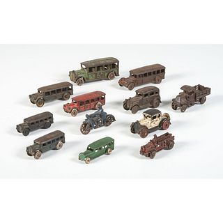 Twelve Cast Iron and Metal Painted Toy Vehicles