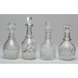 A Group of Four Molded and Cut-Glass Decanters