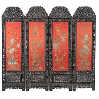 A Chinese Export Carved and Ebonized Silk Embroidery Inset Four Panel Floor Screen