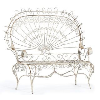 A Victorian White Painted Spiraled Metal Outdoor Love Seat