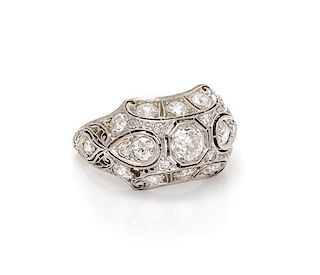 * An Art Deco Platinum and Diamond Ring, 3.60 dwts.
